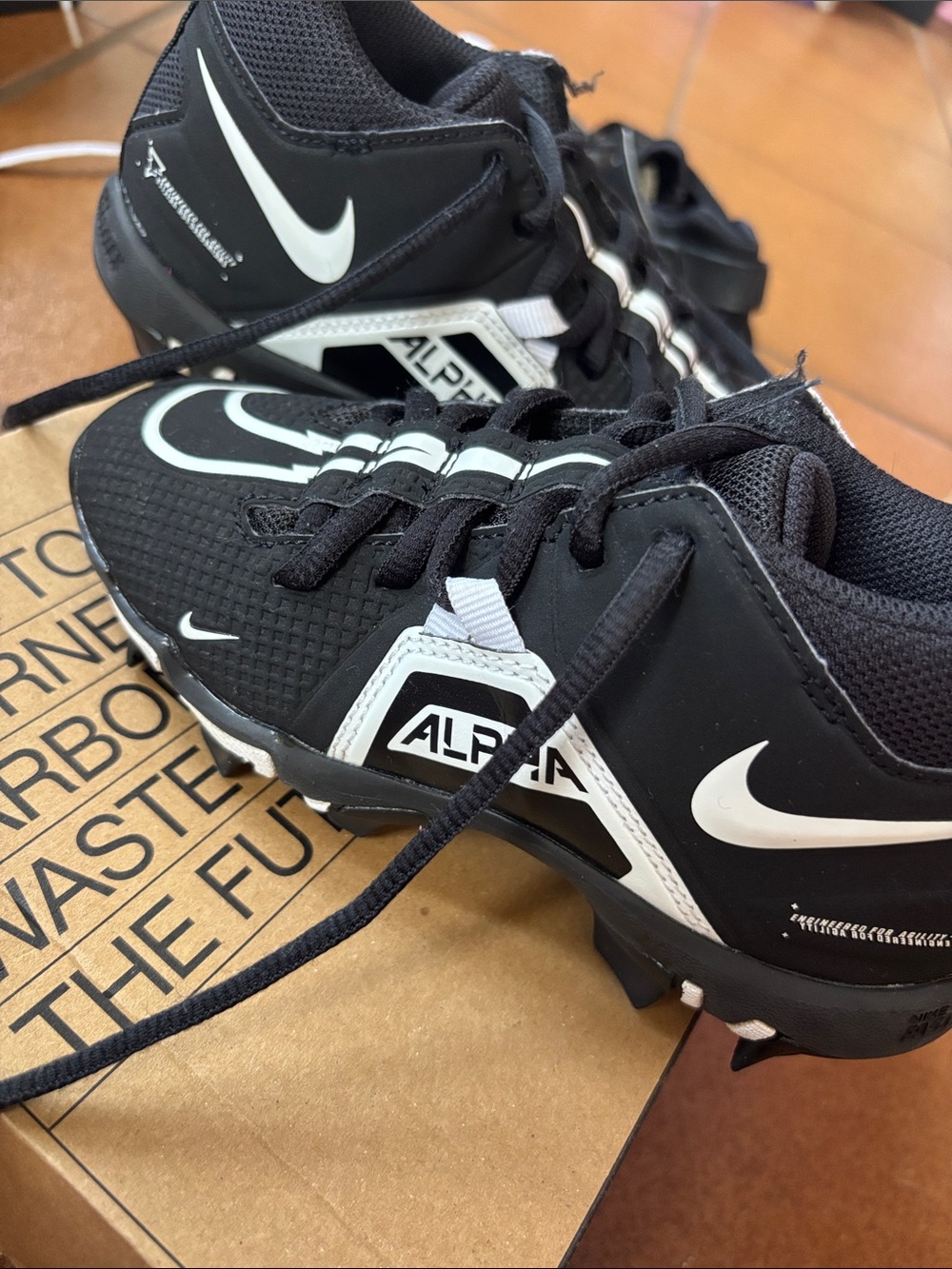 Nike Men’s Black and White Athletic Cleats